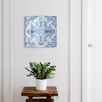 Wall-mounted key box with decorative tile ornaments