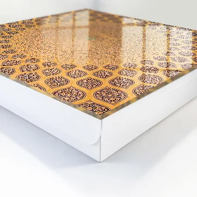 Wall-mounted key box with geometric ornament