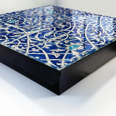 Wall-mounted key box in blue arabesque
