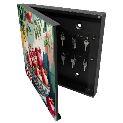 Wall-mounted key box with a fruit motif