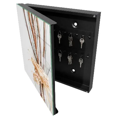 Wall mounted key box with branches in a vase design
