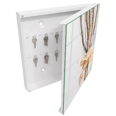 Wall mounted key box with branches in a vase design