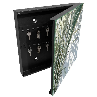 Wall-mounted key box with palms and shadows design