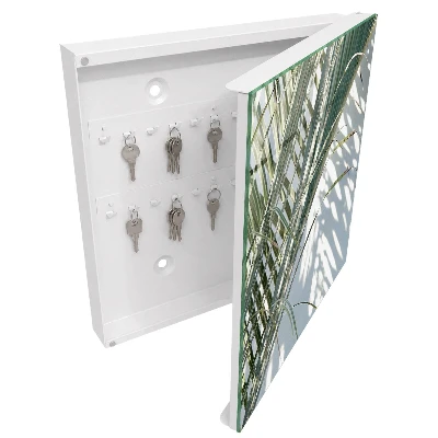 Wall-mounted key box with palms and shadows design