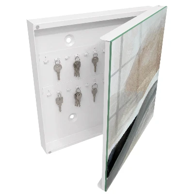 Wall-mounted key box in pastel harmony