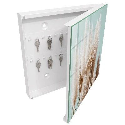 Key cabinet with a natural charm finish