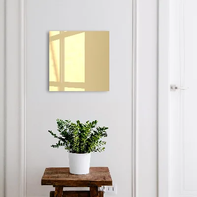 Wall-mounted key box in mustard
