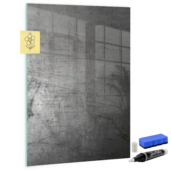 Magnetic dry erase board with a scratched metal finish