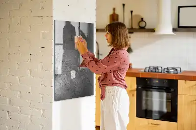 Magnetic dry erase board with a scratched metal finish