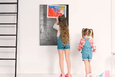 Magnetic dry erase board with a scratched metal finish