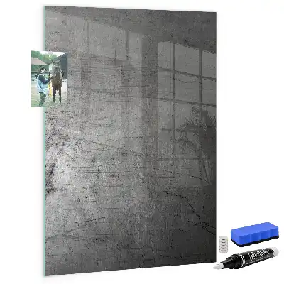 Magnetic dry erase board with a scratched metal finish