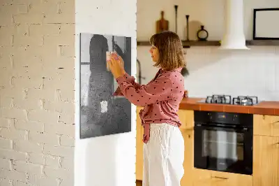 Magnetic dry erase board with a scratched metal finish