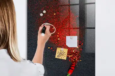 Dry erase magnetic board with ground paprika