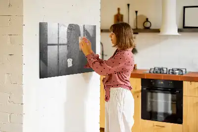 Magnetic dry erase board with a metal wall mount