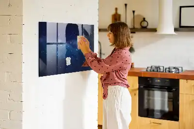 Magnetic dry erase board with a dark sky and stars design