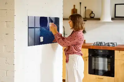 Magnetic dry erase board with a dark sky and stars design