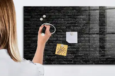 Magnetic dry erase board with a dark brick wall design