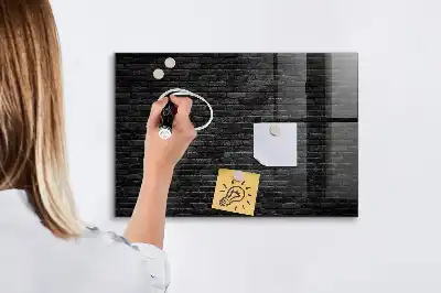 Magnetic dry erase board with a dark brick wall design