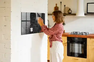 Magnetic dry erase board with a dark brick wall design