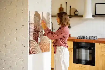 Magnetic writing board with an abstract wave pattern
