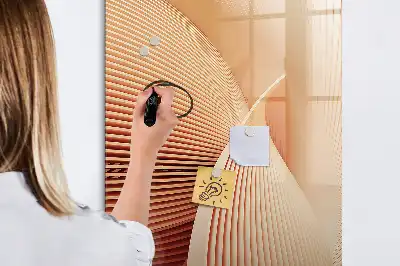 Magnetic writing board with an abstract wave pattern
