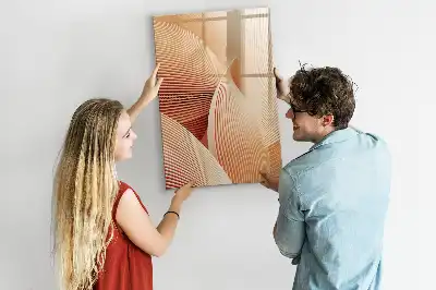 Magnetic writing board with an abstract wave pattern