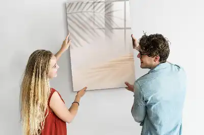 Magnetic writing board with a palm leaf shadow design