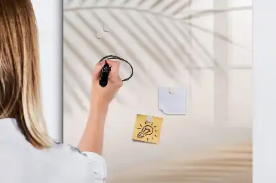 Magnetic writing board with a palm leaf shadow design