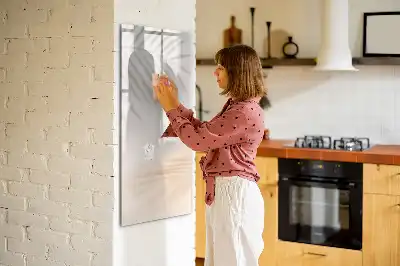 Magnetic writing board with a palm leaf shadow design