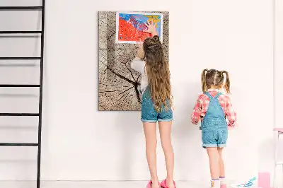 Magnetic dry erase board with a tree trunk cross-section design