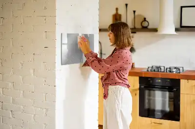 Magnetic glass dry erase board with a metal wall mount