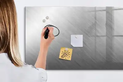 Magnetic glass dry erase board with a metal wall mount
