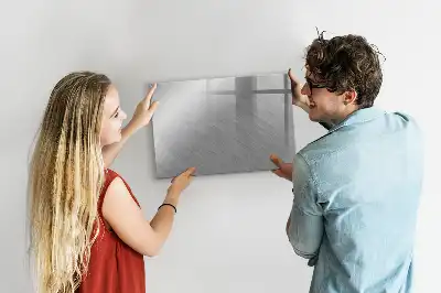 Magnetic glass dry erase board with a metal wall mount
