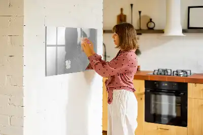 Magnetic glass dry erase board with a metal wall mount