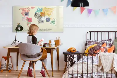Magnetic glass dry erase board featuring a world map made from letters