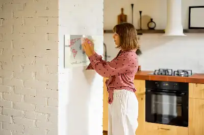 Magnetic glass dry erase board featuring a world map made from letters