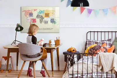 Magnetic glass dry erase board featuring a world map made from letters