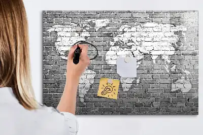 Magnetic glass dry erase board featuring a world map on a brick background