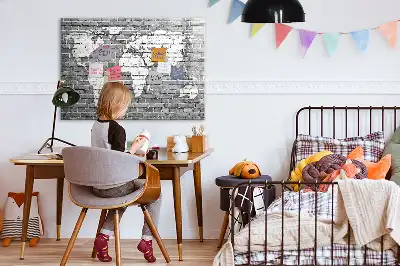 Magnetic glass dry erase board featuring a world map on a brick background