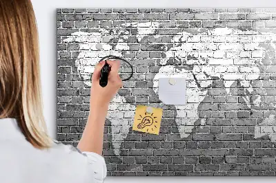 Magnetic glass dry erase board featuring a world map on a brick background