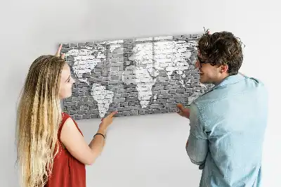 Magnetic glass dry erase board featuring a world map on a brick background