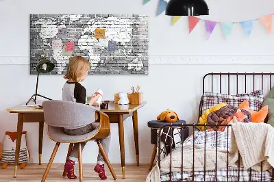 Magnetic glass dry erase board featuring a world map on a brick background