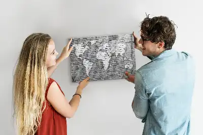 Magnetic glass dry erase board featuring a world map on a brick background