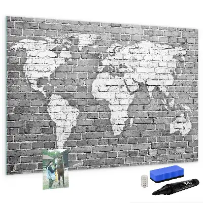 Magnetic glass dry erase board featuring a world map on a brick background