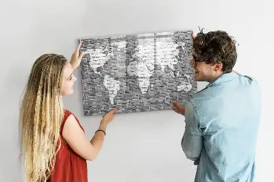 Magnetic glass dry erase board featuring a world map on a brick background