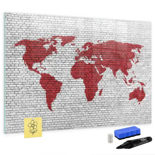 Magnetic marker board world map on a brick wall
