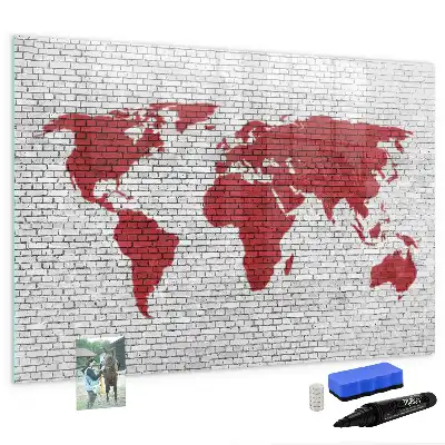 Magnetic marker board world map on a brick wall