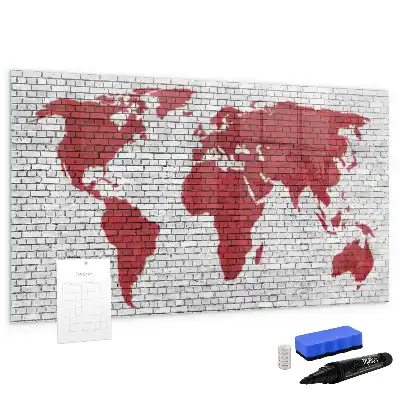 Magnetic marker board world map on a brick wall