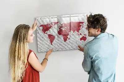 Magnetic marker board world map on a brick wall