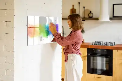 Magnetic glass dry erase board with an abstract rainbow design